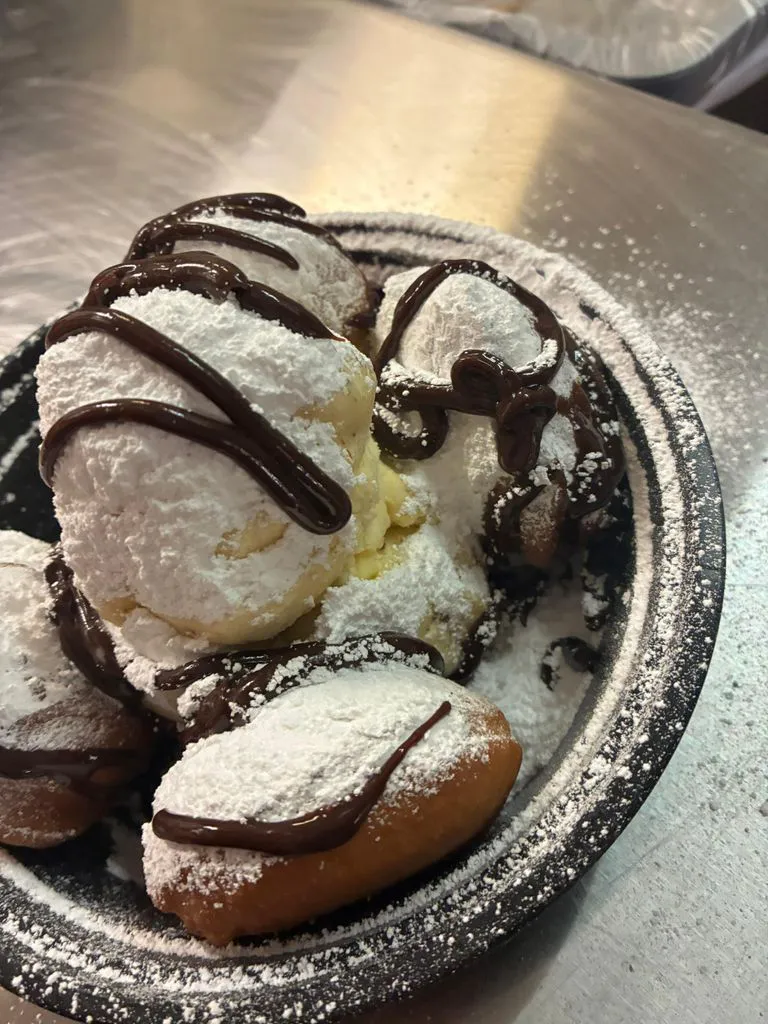 Beignets with Chocolate Sauce at Bourbon Street Sweet & Savory, Asian Fusion Restaurant in Yucaipa